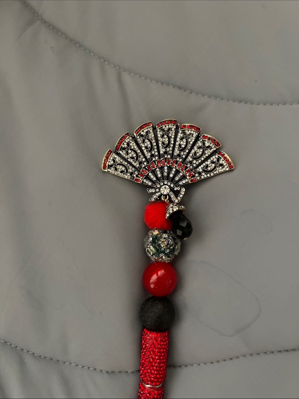 Fan Tassel with Red and Black Beads
